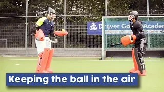 Goalie Warming up drill: Keeping the ball in the air | Hockey Heroes TV