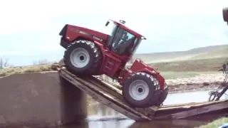 Tractor on bridge cave-in