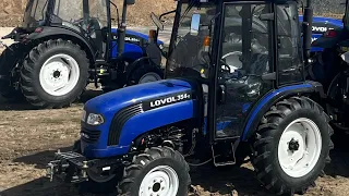 Синий трактор Ловол 354, 35 л.с.