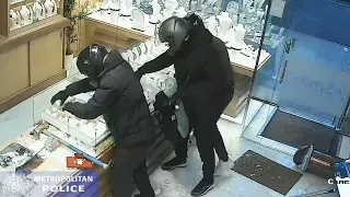 Dramatic smash-and-grab robbery at west London jewellers is caught on CCTV