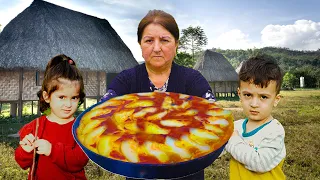 Grandmother made a pie in the oven from the pear in her garden