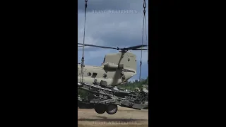Boeing CH-47 Chinook Soldiers sling-load M777 Howitzers