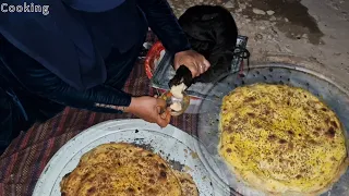 Making delicious local bread with fire by a nomadic mother