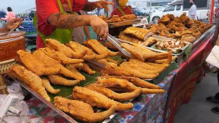 crispy fried whole pork belly, fried pork feet - thai street food