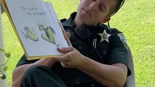 LCSO Deputy Dehner reads "Piranhas Don't eat Bananas" by Aaron Blabey