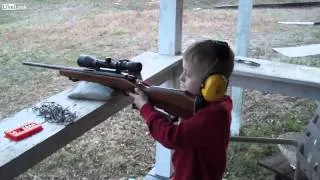 8 year old kid shooting a 308 rifle