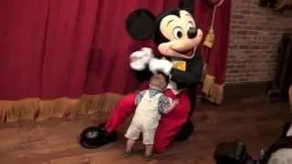 Baby Boy Hugging Mickey Mouse at Disney World