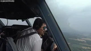 Airbus A300-600 approach and landing on runway 35L of Milan Malpensa airport at rainy day.(LIMC/MXP)