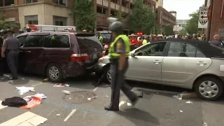 Car plows into Va. protesters
