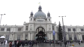 People at Lviv train station wait to depart Ukraine | AFP