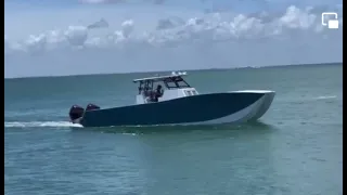 Jaguar 37ft Catamaran running through haulover inlet