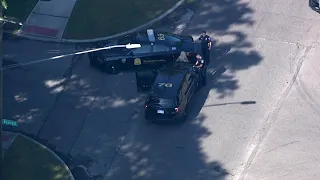 Aerial video of woman arrested during search for Southfield police chase suspect in Detroit