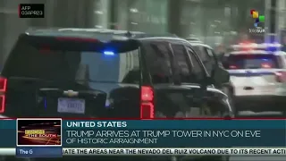 Donald Trump arrives in New York and awaits trial