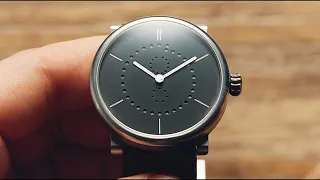 The Holes in this Watch Dial Share a Secret Code...