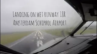 Landing on a rainy day on runway 18R Amsterdam Schiphol Airport (AMS EHAM)