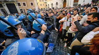 Italian protesters scuffle with police over Covid restrictions