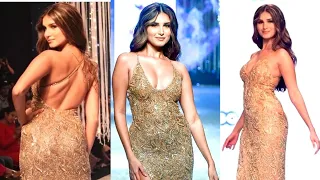 Tara Sutaria Walks In A BOLD Golden Dress At Bombay Times Fashion Week 2022