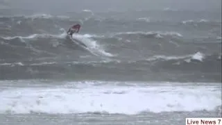 Extreme windsurfers battle wind and 20ft waves