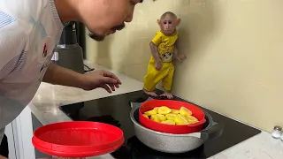 Monkey BiBi enlisted to get up early to help dad cook breakfast!