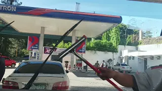 Petron windshield cleaning