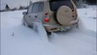 Нива Шевроле с цепями противоскольжения