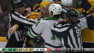 Scrum ensued after Jamie Benn hits Filip Forsberg to the boards