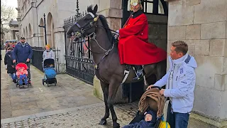 MOVE AWAY! Guard SHOUTS as Tourist puts small CHILD in danger next to a HUGE KING'S Horse!