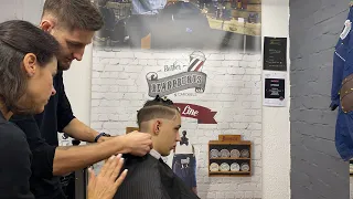 Мужская стрижка Undercut с техникой среднего Fade