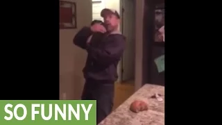 Dad has awesome reaction to new puppy surprise