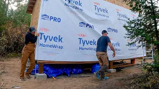 WE TOOK A BREAK | Wrapping our off grid tiny home with tyvek | Our first video of 2024!