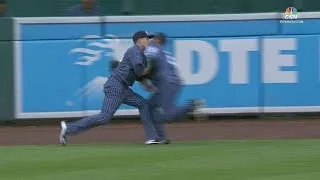 CWS@DET: Coats holds onto catch after scary collision