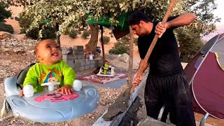 Documentary about the life of a nomadic father and baby: A new initiative to build a cement hut