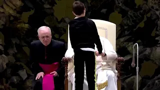 A boy and the Pope