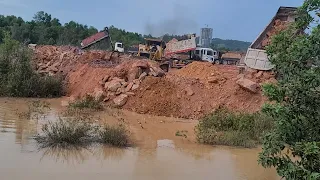 Nice Extremely Filling Stone With Komatsu Dozers and Dump Trucks Team process