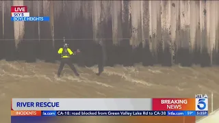 L.A. firefighters rescue man from rain-swollen Los Angeles River