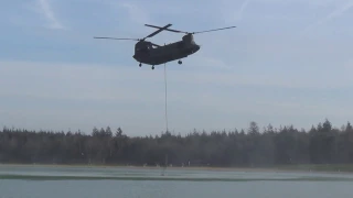 RNLAF Chinook and Cougar Fire Bucket Operations training A.S.K. 't Harde and Heerderstrand