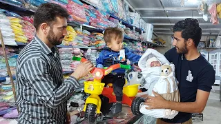 "Journey to Town: Orphaned Children's Shopping Adventure with Their Father"