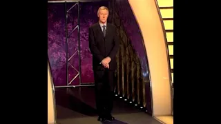 Chris Tarrant Stands Waiting Looking at nobody