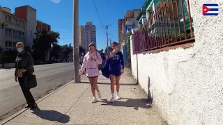 Cuba, Havana - Calle 23. Busy street in El Vedado district.