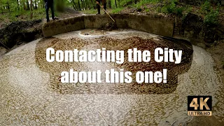 Unclogging the Culvert at a small retention pond in 4K