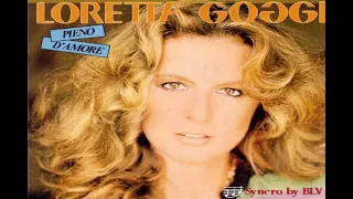 Loretta Goggi - Pieno d'amore, canto e testo