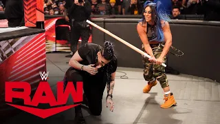 Mia Yim takes out Rhea Ripley with a Kendo Stick