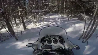 POLARIS INDY 500 LX wide track breaking trail after maines blizzard