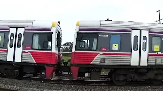 Freight and passenger trains on the North-East line of Victoria