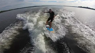 Trying to perfect the wakesurf tail flick or tail whip.