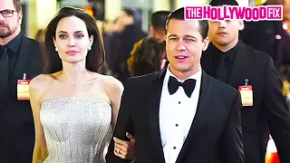 Brad Pitt & Angelina Jolie Sign Autographs For A Mob Of Fans At The 'By The Sea' Movie Premiere