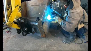 Modifying an excavator bucket