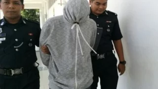 Immigration officer charged with sexually assaulting Thai masseuse