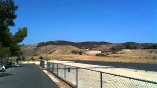 Full scale helicopter illegally landing at model airfield