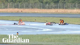 Climate activists glue themselves to Hamburg airport runway